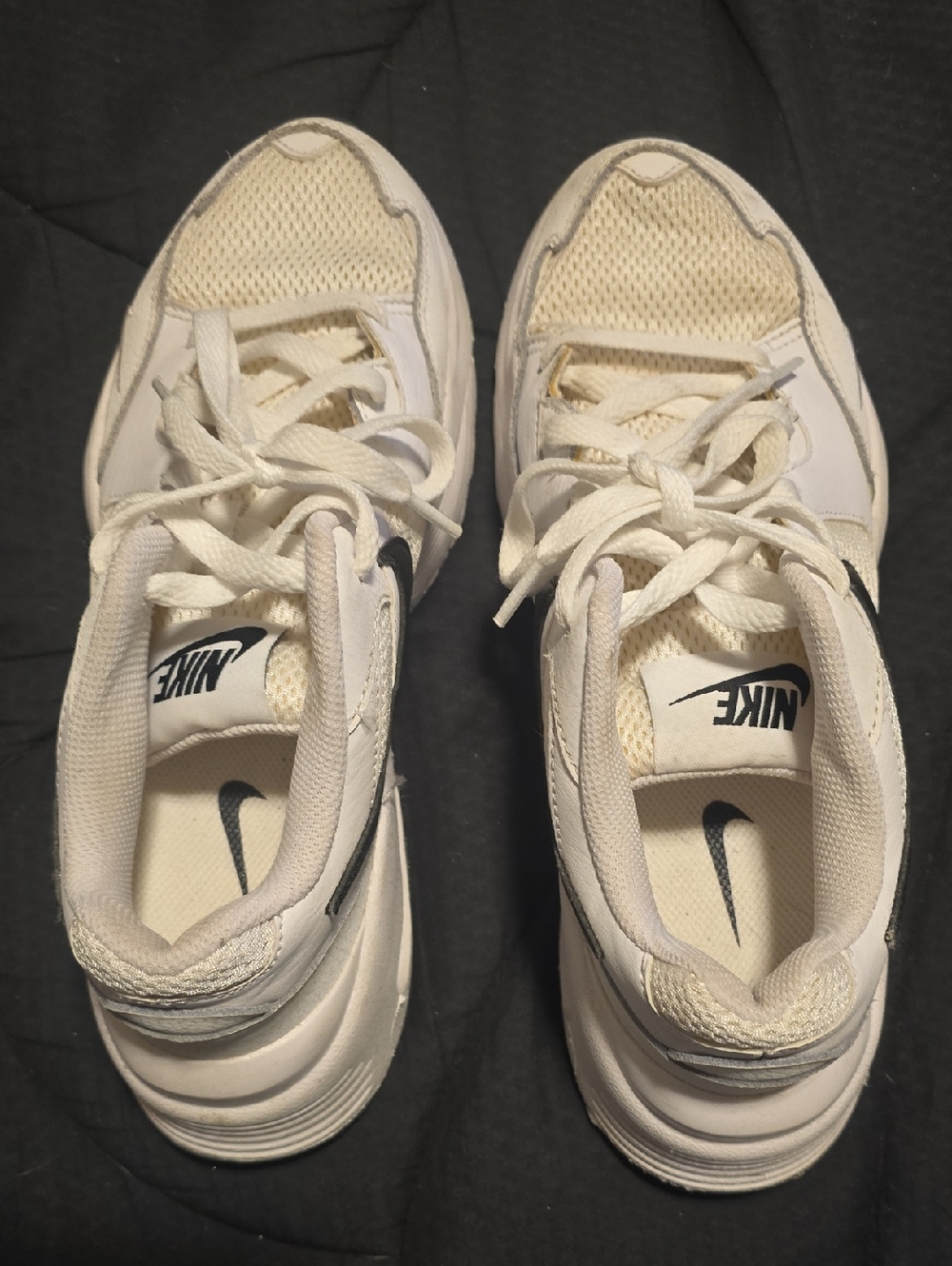 Nike Cream and White Low-Top Running Sneakers with Black Swoosh